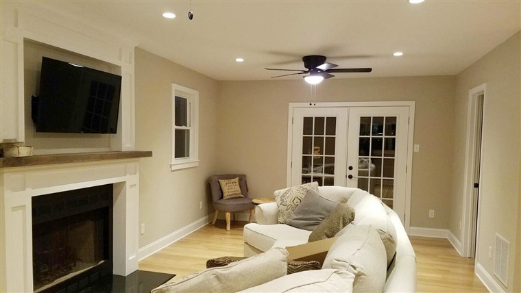 后： The newly renovated living room in Meredith Borrell and Brian Ketcik's house.