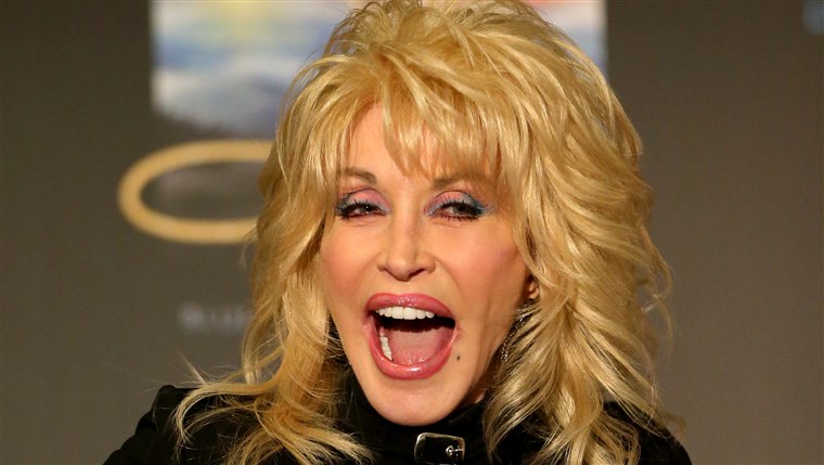 кукличка Parton speaks to the media during a press conference at Rod Laver Arena on February 11, 2014 in Melbourne, ...
