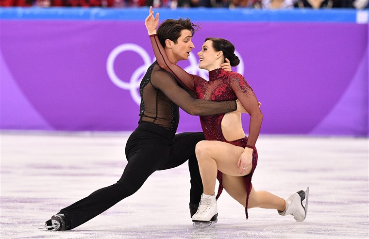 Канада's Tessa Virtue and Scott Moir compete in the team free dance during the Pyeongchang 2018 Winter Olympic Games.