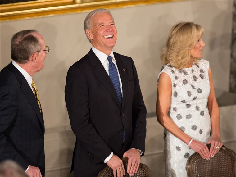 بايدن has a laugh with Senator Lamar Alexander and his wife, Dr. Jill Biden, at the Inaugural Luncheon in Statuary Hall on Monday.