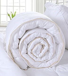 تساوي الليل والنهار alternative down comforter rolled up