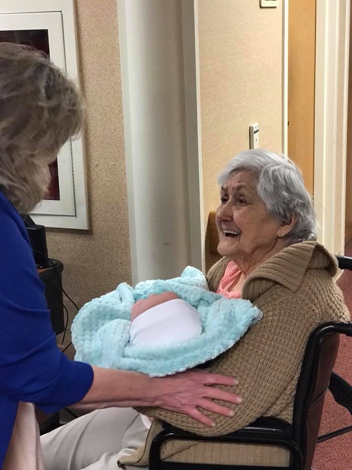 Alzheimer's patients show joy when they receive baby dolls
