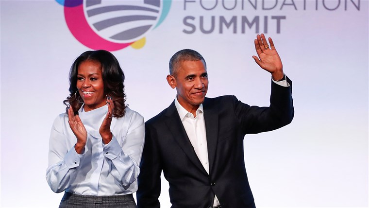 Изображение: Former U.S. President Barack Obama and former first lady Michelle Obama arrive for the Obama Foundation Summit in Chicago