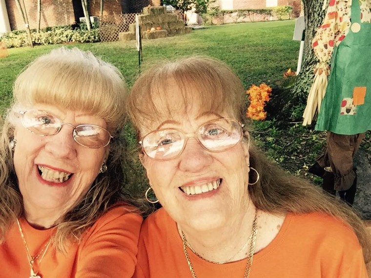 Zwilling women in orange