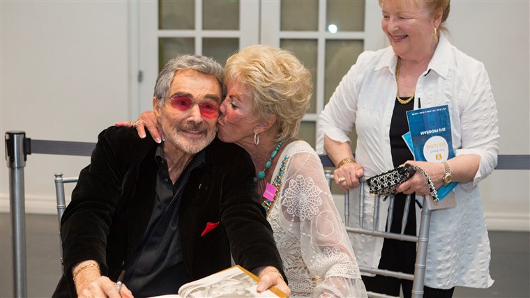 伯特 Reynolds and Ann Lawlor Scurry, who were high-school sweethearts, reunite at the Palm Beach Book Festival on April 2, 2016.