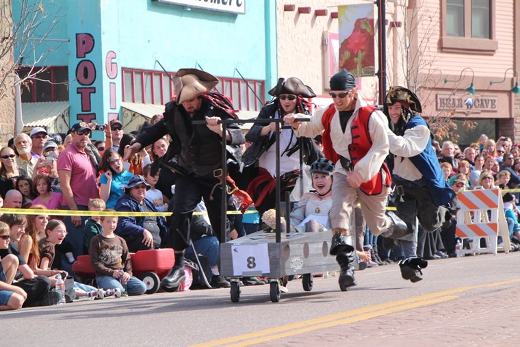Schauer me timbers! A team dressed as pirates participates in the Emma Crawford Coffin Race in Manitou Springs, Colo.