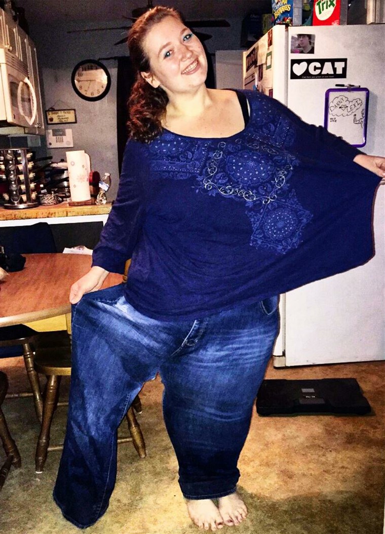Nach losing 236 pounds in a year, Lexi Reed can fit into one leg of the jeans she wore when she weighed 485 pounds. She hopes to continue losing and being healthy.