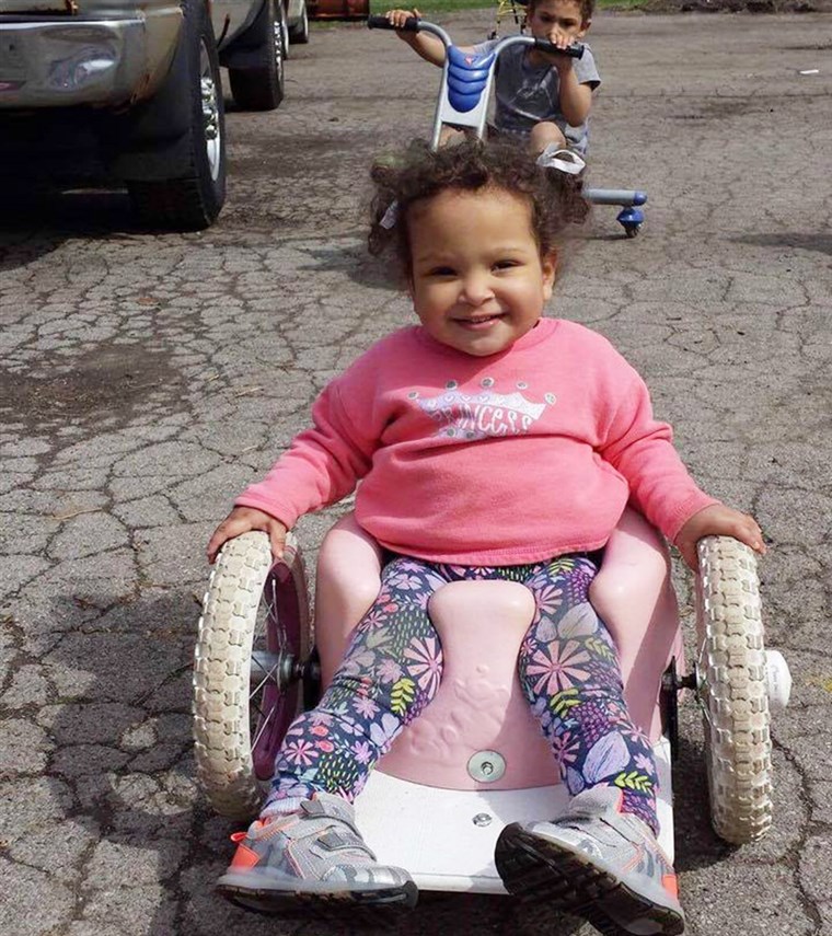 Vielen Dank to a Bumbo-seat wheelchair, Bella Shorr can chase her brother and sister around outside.