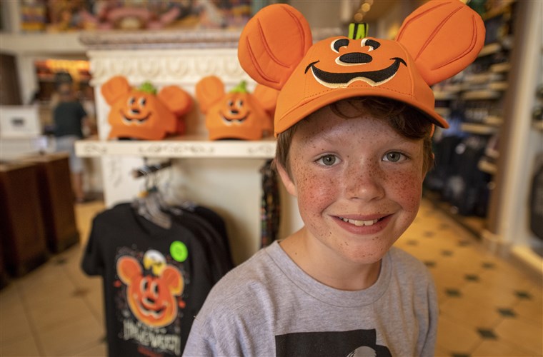 от light up trick-or-treat buckets to baseball hats, Miller says Mickey Mouse pumpkins play a large role in the 2018 Halloween merchandise line.