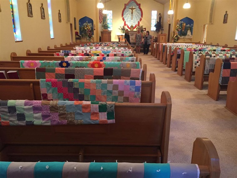 Margaret Hubl's quilts were draped over each pew at her church to honor her memory.