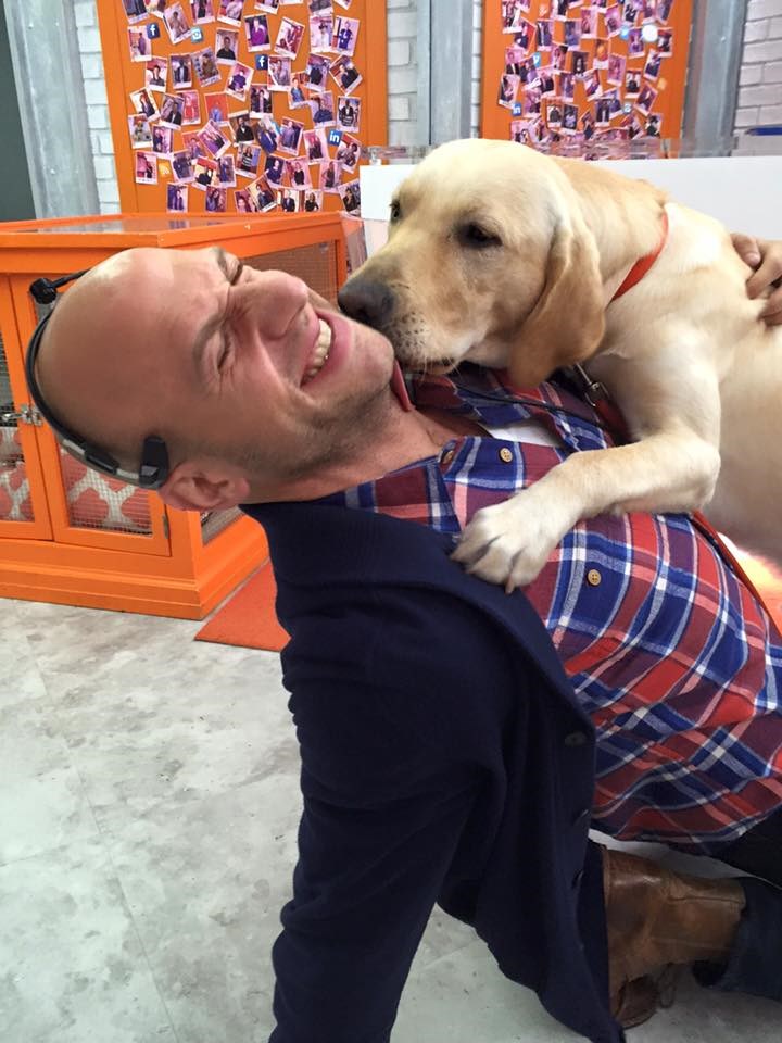 Josef Herzog gets kisses from Wrangler, TODAY's puppy with a purpose.
