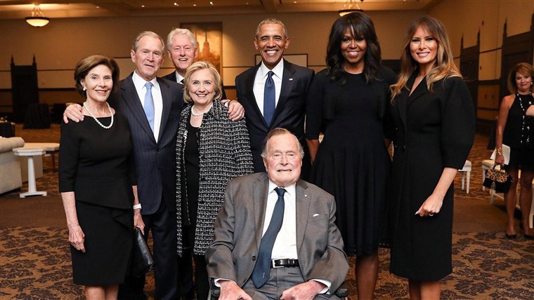 صورة فوتوغرافية of former U.S. Presidents and first ladies posing with Melania Trump at Barbara Bush's funeral