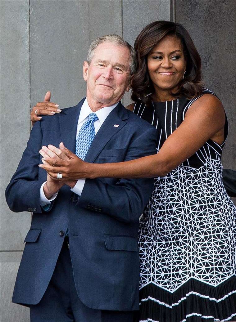 Джордж W. Bush got a sweet hug from Michelle Obama at the opening ceremony for the Smithsonian National Museum of African American History and Culture on Sept. 24 in Washington, D.C.