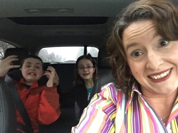 Mama Christine Burke in car with her kids