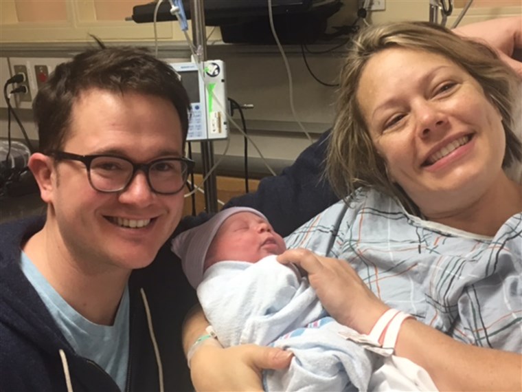Dylan Dreyer and her husband, Brian Fichera, pose with their bundle of joy shortly after his birth.