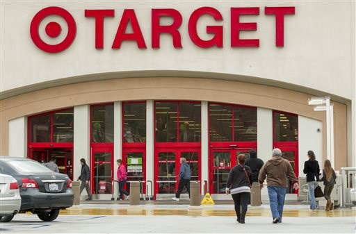 个人 arrive at a Target store in Los Angeles on Thursday, Dec. 19, 2013. Target says that about 40 million credit and debit card accounts may have...
