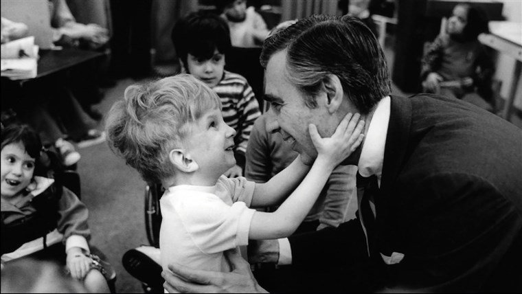 Fred Rogers meets with a disabled boy